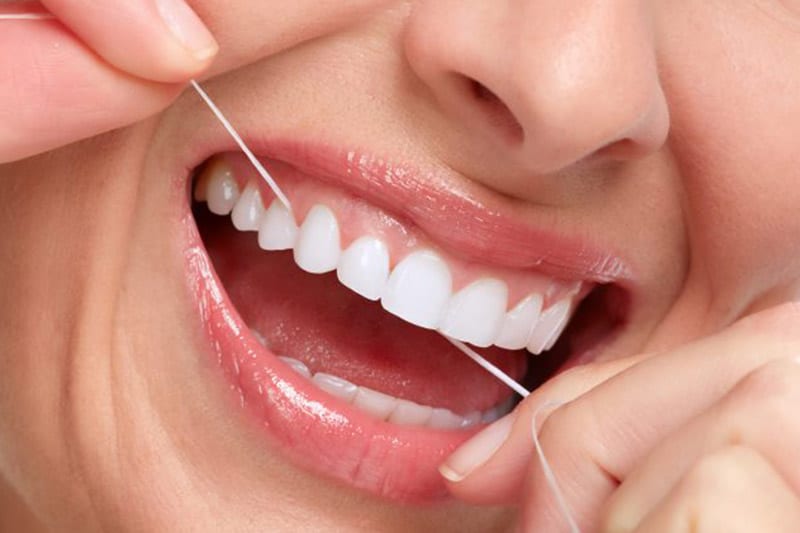 Proper flossing of teeth - Dentus perfectus